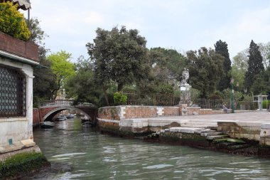 Venice, Italy - April 30 2019: Away from the crowds of tourists, Venice boasts many beautiful neighborhoods and parks to explore. clipart