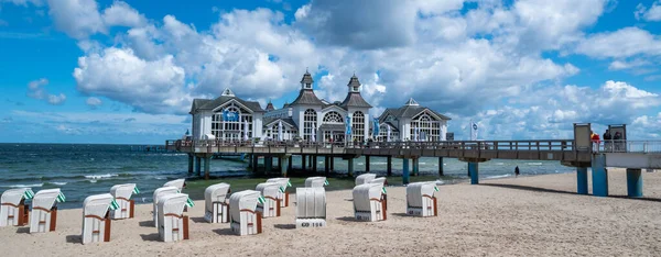 Stock image Sellin, Germany - July 16, 2022: Historic building at pier in the Baltic seaside resort of Sellin on the German island of Ruegen.