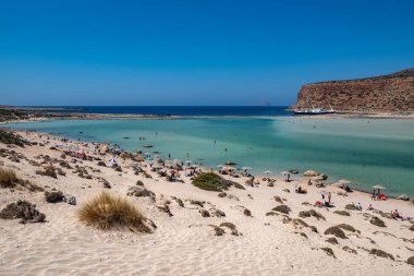 Amazing view of Balos beach and lagoon. Magical turquoise waters, lagoons, tropical beaches of pure white sand on Crete, Greece clipart