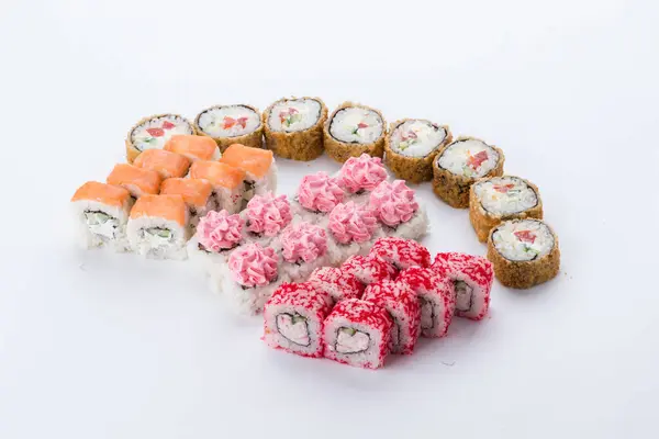 Sushi set and composition at white background. Japanese food restaurant, sushi maki gunkan roll plate or platter set.