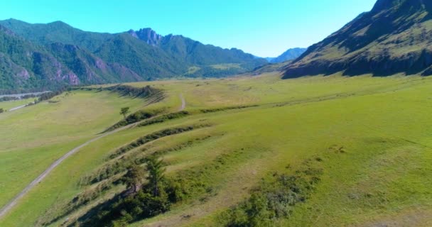 Aerial Uhd Mid Air Flight Rural Mountain Road Meadow Sunny — Stock Video