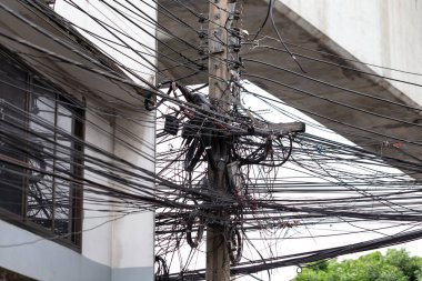 The high-voltage cables are tangled in a mess.