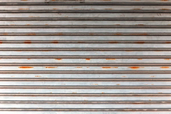 Old corrugated sheet metal door