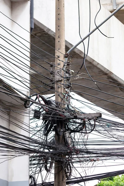 The high-voltage cables are tangled in a mess.