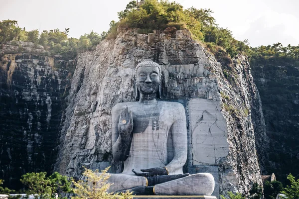 stock image Giant stone buddha statue at Wat Khao Tham Thiam, Suphanburi province , Thailand.