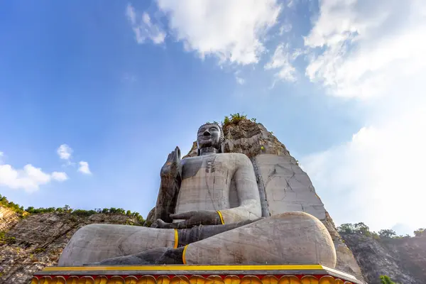 stock image Giant stone buddha statue at Wat Khao Tham Thiam, Suphanburi province , Thailand.