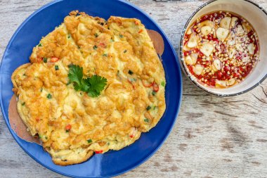 Thai omelets with fish sauce