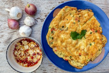 Thai omelets with fish sauce