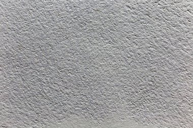 Gri arkaplanı olan beton duvar