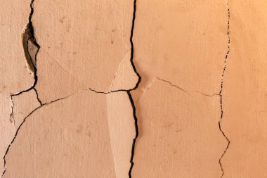 Cracked concrete building broken wall