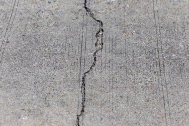 Çatlak beton duvar çatlaklar ve asfalt, soyut arkaplan.