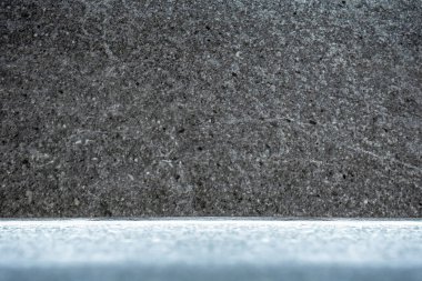 black background with a white surface