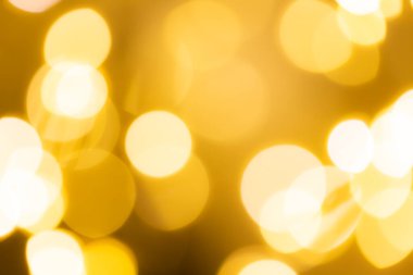Bulanık ışık ile altın bokeh soyut arkaplan.