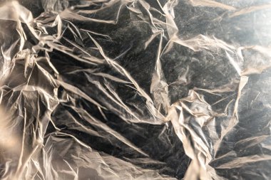 Buruşmuş alüminyum folyo dokusu. Tasarım için soyut arkaplan ve doku.