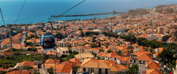 aerial view of Funchal panorama with traditional cable car. Madeira island, Portugal