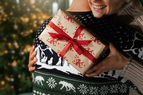 Woman Embrace Her Husband Next Christmas Tree Receiving Gift Box — Stock Photo, Image