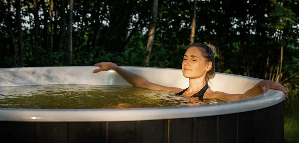 Woman Relaxing Outdoor Forest Hot Tub Sunset Nature Spa Banner — Stock Photo, Image