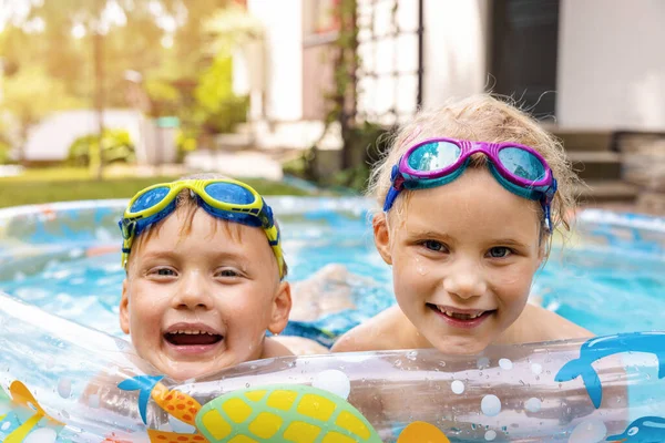 Happy Children Having Fun Inflatable Swimming Pool Home Backyard Hot Stok Resim
