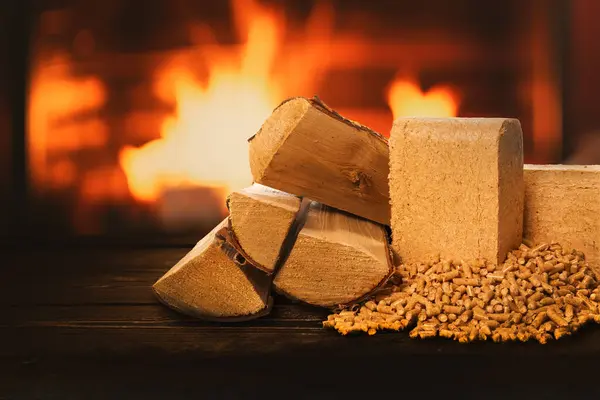 Biomass Heating Firewood Pellets Briquettes Wood Burning Fireplace Background Sustainable — Stock Photo, Image