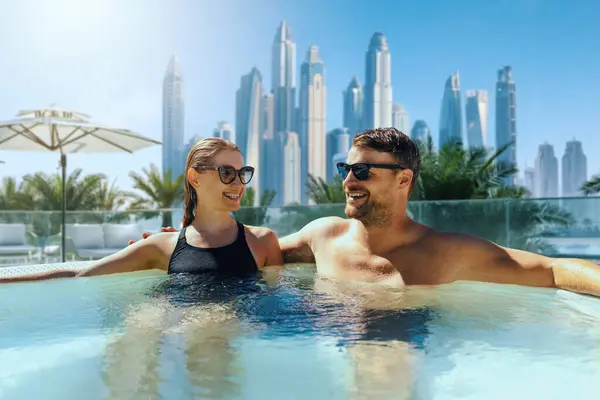 Happy Young Couple Relaxing Outdoor Hot Tub Dubai Hotel Luxury 스톡 사진