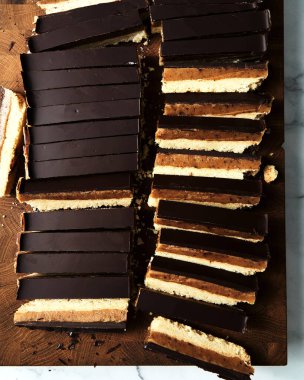 Millionaires Shortbread Cookies: shortbread with caramel and dark chocolate on the top. . High quality photo