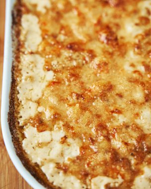 Scallops baked under creamy sauce. High quality photo