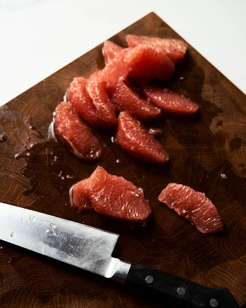 Peeled Sliced Divided Sections Grapefruit Wooden Board Knife Next Board — Stock Photo, Image