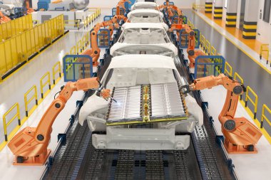 Otomotiv otomobil fabrikası konsepti. Platformunda elektrikli araba aküsü modülü olan 3 boyutlu robot montaj hattı.