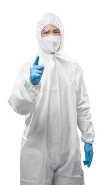 Worker wears medical protective suit or white coverall suit with mask and goggles finger point isolated on white background