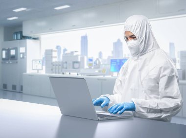 Worker or engineer wears protective suit or white coverall suit work in semiconductor manufacturing factory