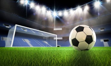 3D futbol ya da futbol topu sahada futbol sahasının arka planında
