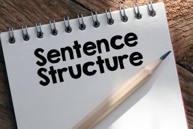 SENTENCE STRUCTURE words in a white notepad. Business concept clipart