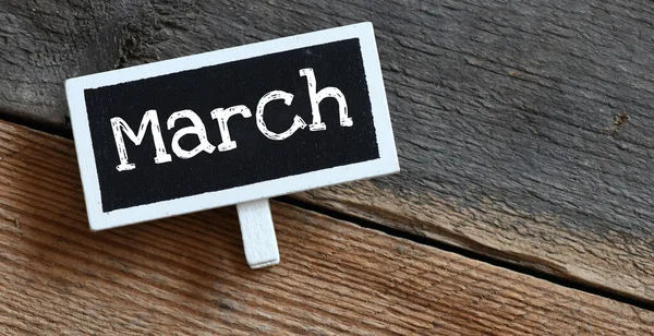 Março Sobre Placa Giz Mesa — Fotografia de Stock