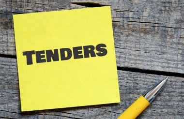 TENDERS küçük bir kağıt parçası üzerinde kelime.