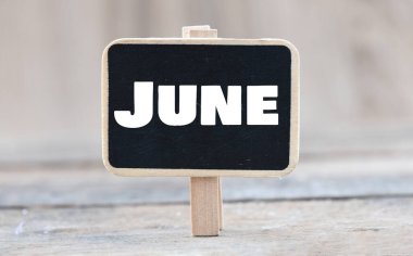 June word on a small chalk board. clipart