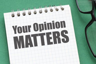 Fikriniz, yeşil bir masanın üstündeki bir ofis defterindeki kelimelerle aynıdır..