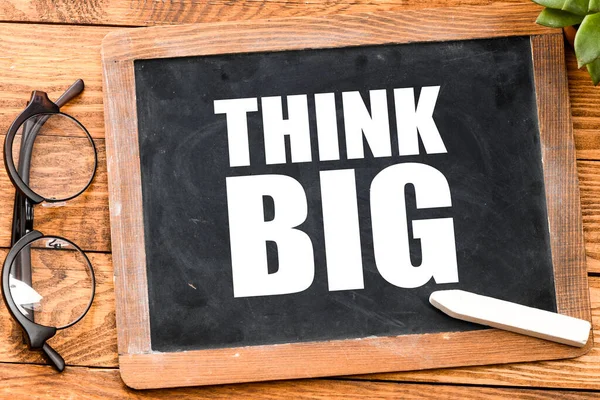 Think Big Words Chalk Board Wooden Table — Stock Photo, Image