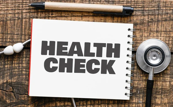 Gezondheid Check Woord Notebook Naast Stethoscoop — Stockfoto