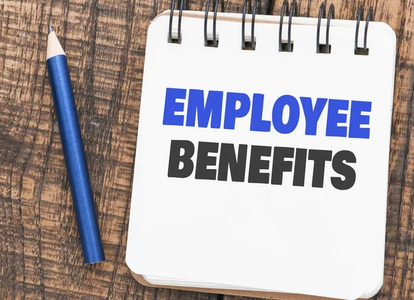 EMPLOYEE BENEFITS words in notebook - TECHNOLOGY COMMUNICATION