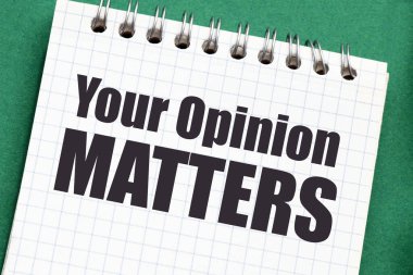 Fikriniz, yeşil bir masanın üstündeki bir ofis defterindeki kelimelerle aynıdır..