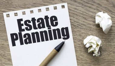 Bir kağıt parçasında emlak planlama sözcükleri.