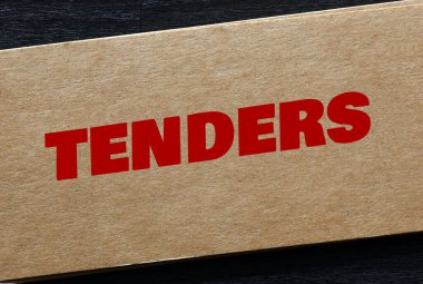 TENDERS word on a piece of paper. Concept for business. clipart