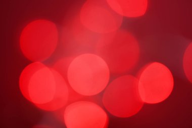 Tatil ışıkları arka planı veya Noel arka planı için kırmızı ışık bokeh