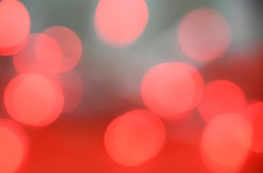 Renkli kırmızı tatil bokeh ile bulanık Noel ışıkları arka planı