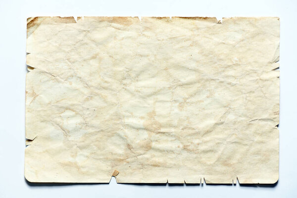 Old torn paper on a white background.