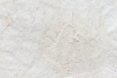 çatlaklarla ve çiziklerle kaplı bir duvarın dokusu