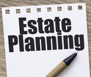 Bir kağıt parçasında emlak planlama sözcükleri.