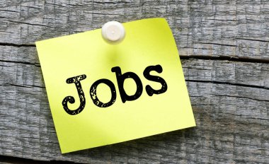 Küçük bir kağıt parçasına iş sözü. İş konsepti.