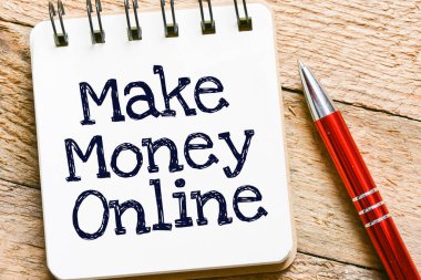 Not defterine yazı yazarak para kazanabilirsin. İş konsepti.