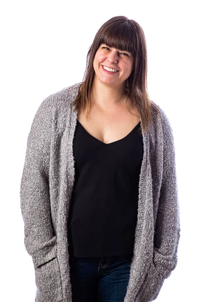 40歳の女性の孤立した肖像画 灰色のベストを着て 大きな笑顔で ストック写真